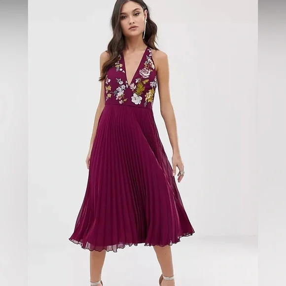 ASOS DESIGN embroidered midi dress with halter neck and pleated skirt